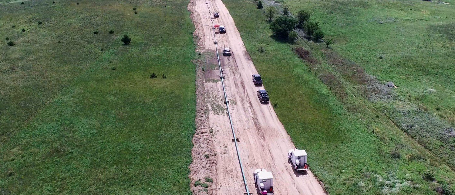 Aerial view of a Tucker Construction spread working along a pipeline right-of-way