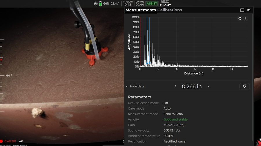 Ultrasonic A-scan readout taken in flight, showing a wall thickness measurement
